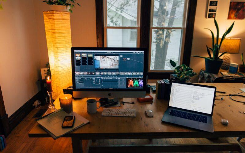 modern workplace with gadgets in cozy room with soft light