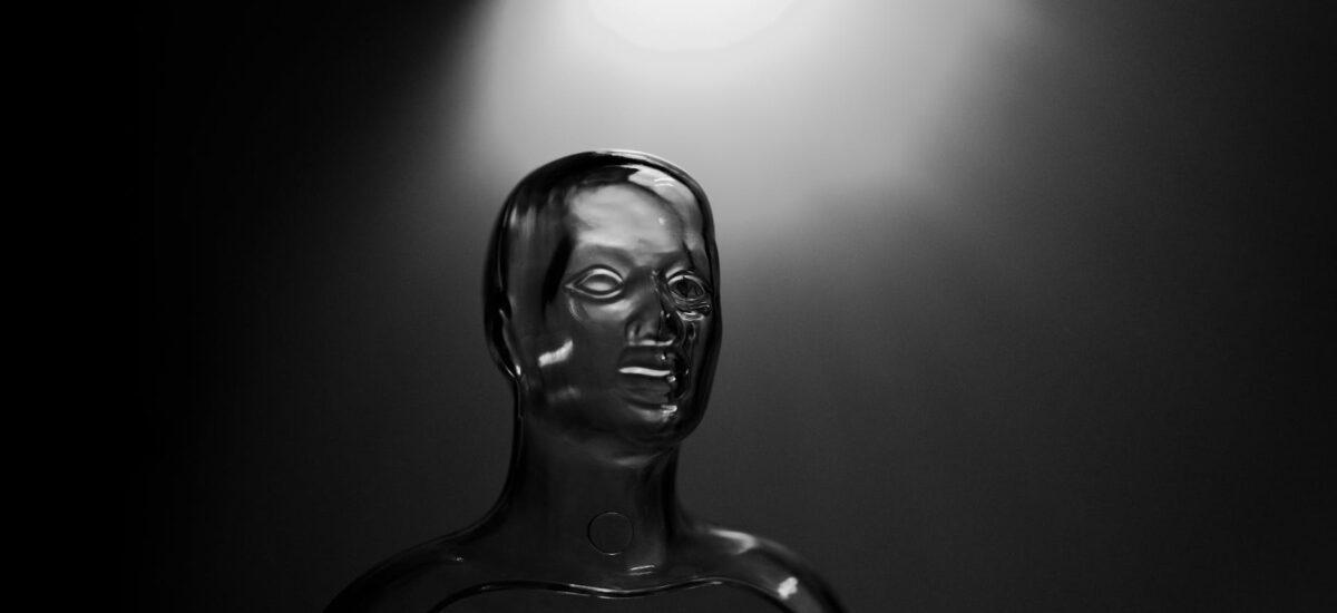 black and white photo of a transparent mannequin